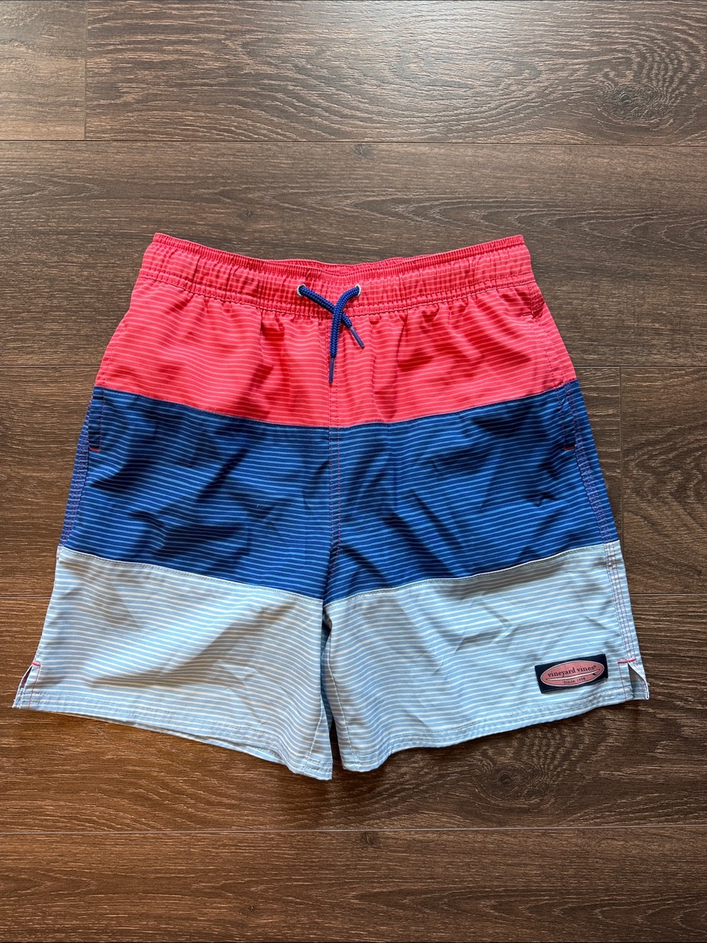 Vineyard Vines Kids Colorblock Swim Trunks in Coral, Blue & Light Blue
